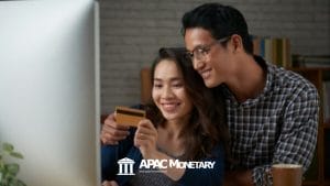 a couple holding supplementary credit cards